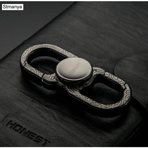 Stmanya New High quality Metal Key Chain Women Men Fingertip gyro Bag Charm Accessories KeyChains Best Gift jewelry K1579