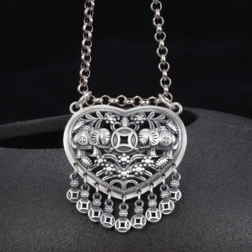 National standard s990 pure silver double elephant tassel pendant female retro ethnic love coin double ring hollow pendant