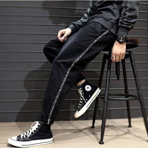 Fashion Men Jeans Black Color Side Stripe Korean Style Designer Harem Pants Streetwear Elastic Hip Hop Jeans Men Pencil Pants