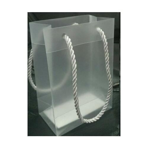 Size:32*25*10cmFast Free shipping.good quality clear PVC packing bag gift bag. 100piece\lot