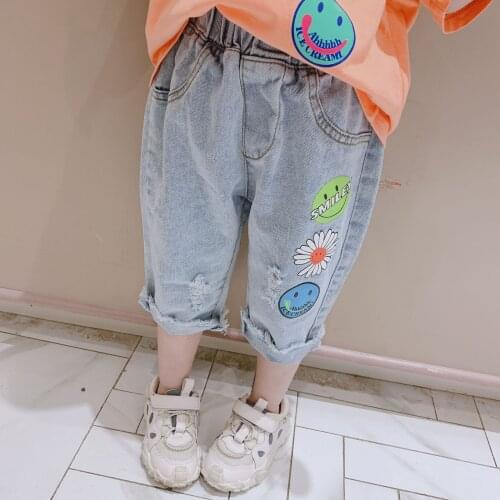 Jeans for Baby Girl 2-7 Y 2021 Summer New Kids Korean Broken Hole Denim Pants Girls Smiley Flower Print Casual Denim Trousers
