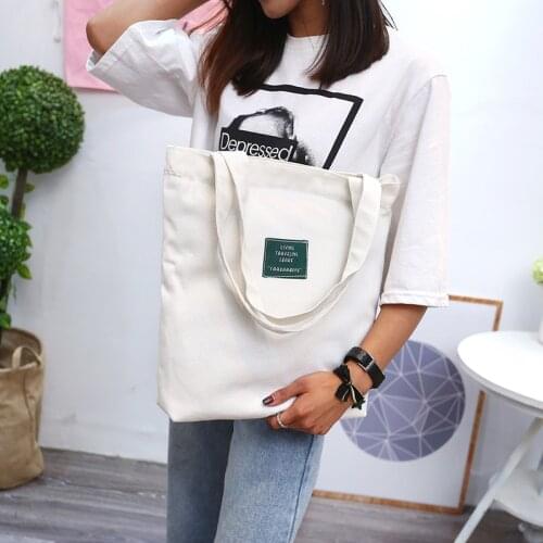 Mall fresh canvas bag with large capacity for women. INS simple student one-shoulder bag with solid color hand-held shopping bag
