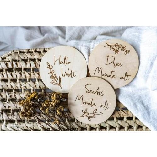 Wooden Baby Milestones as a New Baby Gift wooden discs