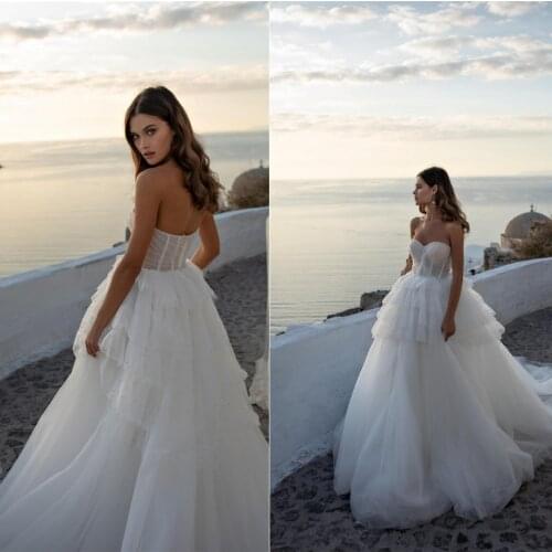 2020 Lace Wedding Dresses Sweetheart Appliques Beads A Line Bridal Gowns Custom Made Sexy Backless Sweep Train Wedding Dress