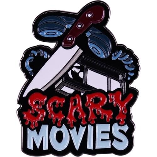 Scary Movies Enamel Pin We make up horrors to help us cope with the real ones