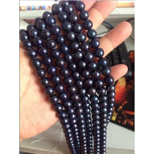 Stunning AAA 9-10mm tahitian round black pearl necklace 50 inch