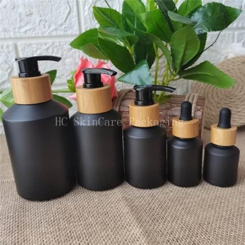 New arrival 60ml 100ml Frosted Black Glass Bottles Empty Shampoo bottle, Pump Lotion Bottle 2pcs Sample Cosmetic Container