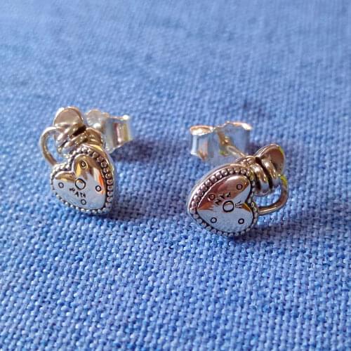 The new lock nail S925 tremella classic sign of love letters O silver padlock earrings heart-shaped contracted earrings female