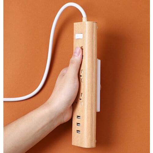 Powerful Traceless Wall-Mounted Sticker Plug Fixer Home Self-Adhesive Socket Cable Wire Organizer Seamless Strip Holder GQ