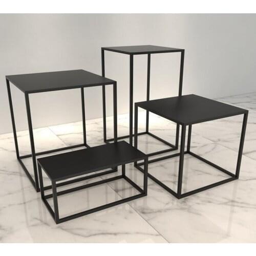 Wrought iron clothing rack clothing store shelf floor coffee table high and low running water table window