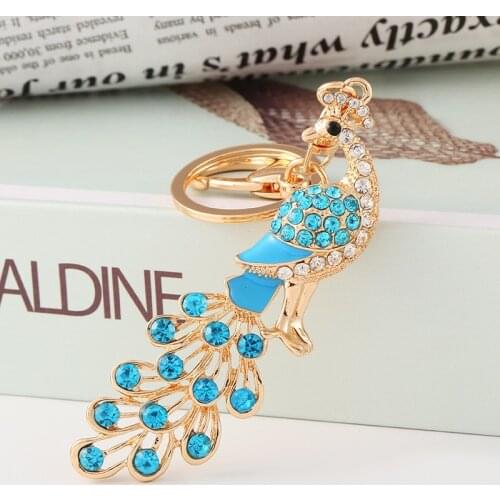 Promotional high quality elegant peacock key chain special design package accessories key chain