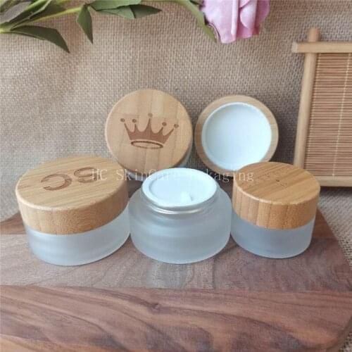 Luxury Mini Frosted Clear Glass Jar Cosmetic Glass Jar for Face Cream Round Glass Cosmetic Jars Engrave Logo Bamboo Cap