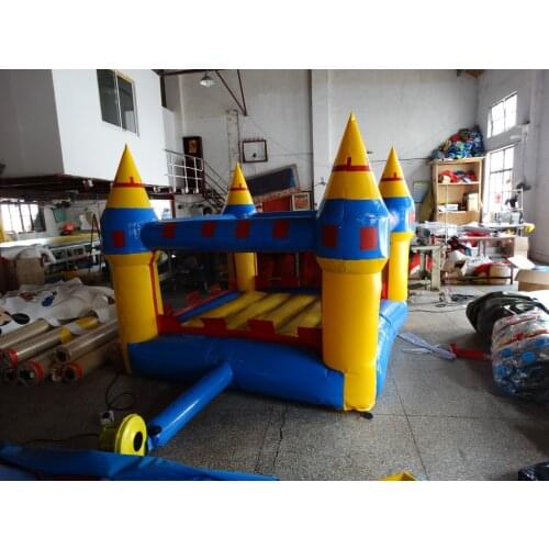Inflatable trampoline kids jumping on play ground in amusement park center
