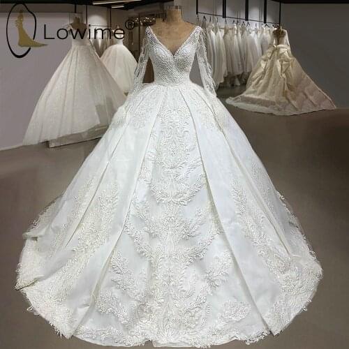 Ivory Illusion Long Sleeve Beading Wedding Dresses Sexy V Neck Feathers See Through Back Ruched Bridal Gowns