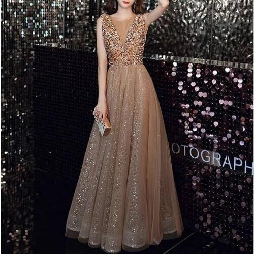 Champagne Gold Prom Dresses V-Neck A-Line Sequined Beaded Sleeveless Shiny Luxury Wedding Guests Evening Bridesmaid Gowns 2021