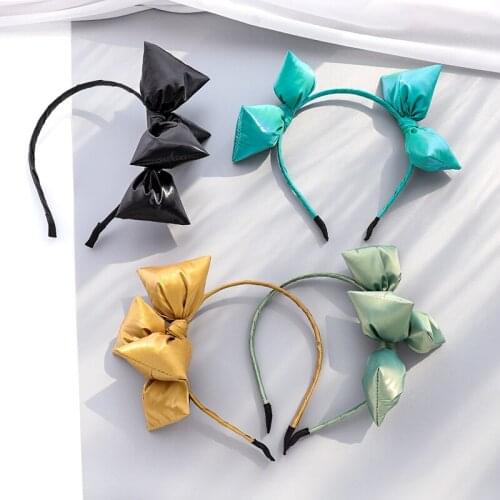 Korean version of Xiaoxiangfeng new product headband autumn and winter shiny fabric bow tie headband hairpin out female headband
