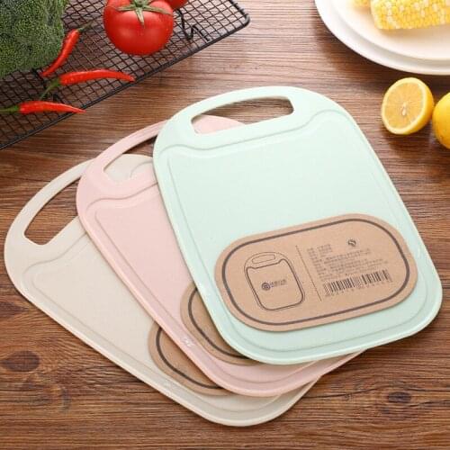 The Chopping Board Is Thickened,plastic Vegetable Board Is Cut Into The Vegetable Board and The Kitchen Tableware At Home