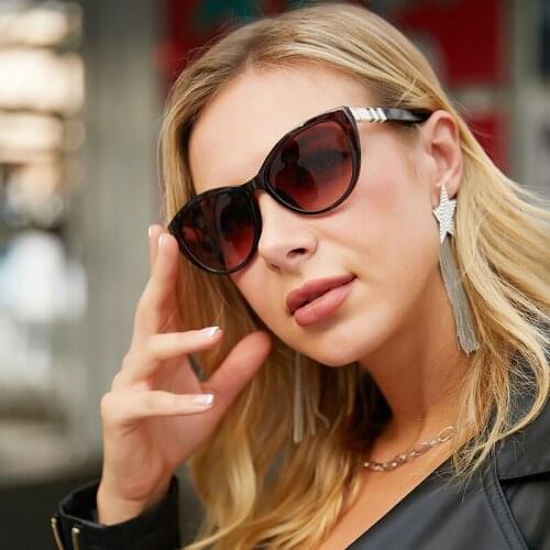Leather cat eye sunglasses woman 2021 new European and American trendy fashion outdoor luxury brand party hiking travel glasses