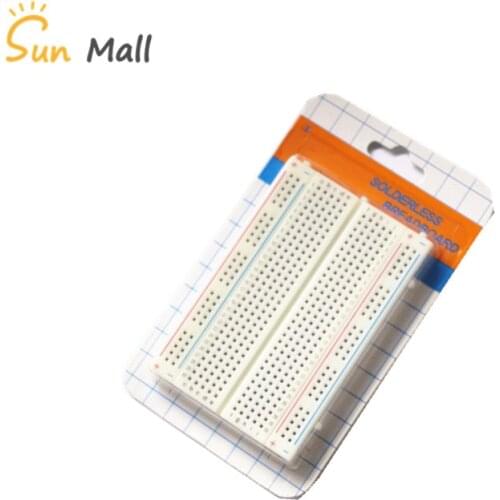 400 holes high quality Solderless Breadboard Self-Adhesiv, size: 8.3x5.5x0.85cm. White color