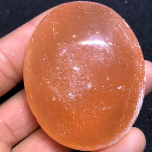 Natural orange selenite palm stone polished gypsum crystal palm healing stone