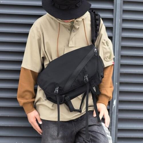 Messenger bag mens backpack locomotive wind ins tide brand shoulder bag Japanese tooling postman student shoulder bag female