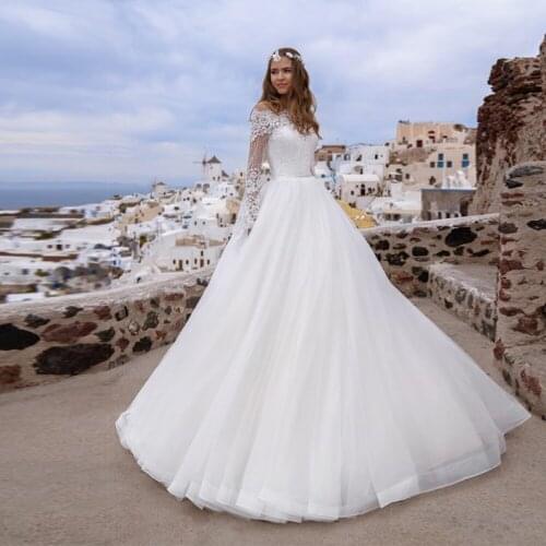 2021 Comfortable Boat Neck Princess Ball Gown Wedding Dresses with Long Sleeves Robe de Mariee Lace Appliques Brides Gowns
