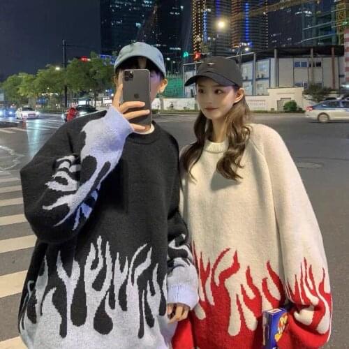 2021 spring new round neck loose sweater female flame jacquard sweater color matching loose Outer wear couples net red sweater