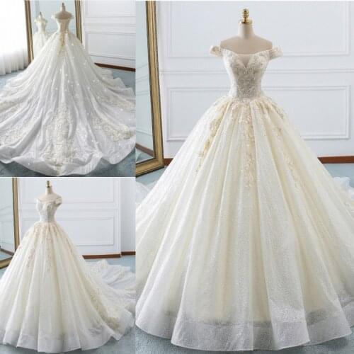 Luxury Wedding Dresses Off Shoulder Appliques Sequin Ball Gowns Bridal Gowns Custom Made Lace-up Back Sweep Train robe de mariée