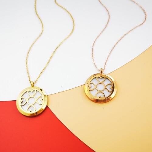 European and American retro fashion trendy men and women hollow love clavicle chain pendant