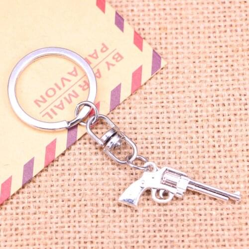 Fashion Keychain 35x15mm machine gun assault rifle Pendants DIY Men Jewelry Car Key Chain Ring Holder Souvenir For Gift