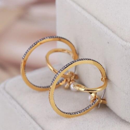 Fashion gold earrings inlaid with zircon three-dimensional circles