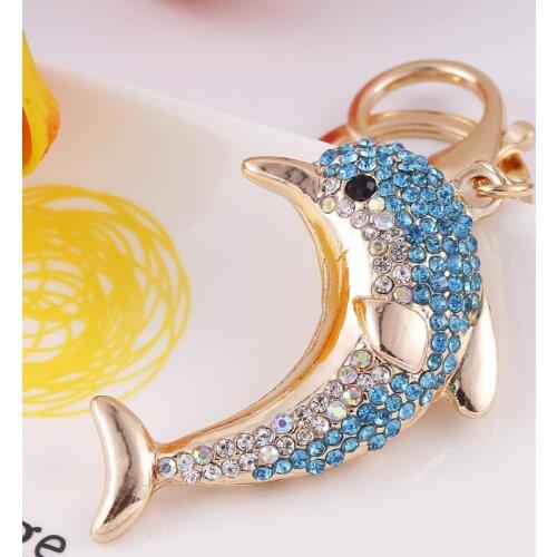 Cute Korean version of the dolphin hug rhinestone keychain girl bag alloy keychain pendant pendant