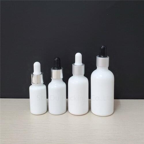500pcs/lot 10ml/15ml/20ml/30ML/50ml/100ml Essential oil glass bottle pearl aluminum cap glass dropper / essence empty bottles