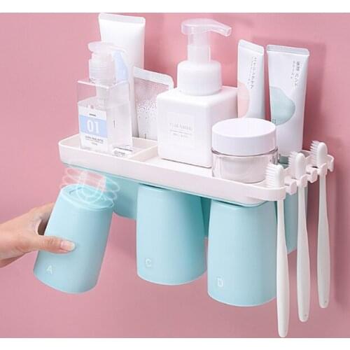 Inverted bituminous space uses one - piece design wall - hanging non - punching magnetic suction toothbrush shelf J05