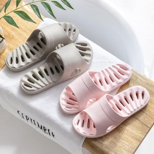 New slippers female massage EVA slippers bathroom leakage bath antiskid word lovers cool slippers female wholesale