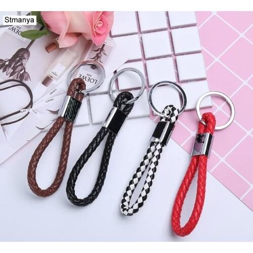 New alloy Key Chain Handmade woven leather rope Keychain Fashion pendant Bag Charms Accessories Simple Car Key Holder K1704