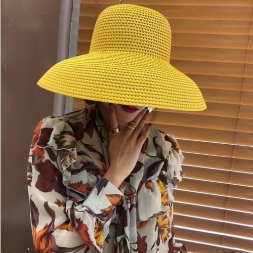 Summer female yellow hollow Hepburn bell-shaped big brim hat shade vacation beach sun straw hat