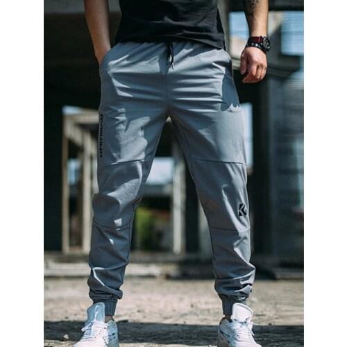 Men Fitness Bodybuilding Long Pants Stretch Patchwork Fashion Sweatpants High Quality Contracted Quick-Drying Training Trousers