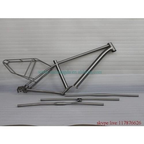 Titanium mountain bicycle frame with normal head tube Rohloff dropouts BB30 BB shell rear rack handle bar
