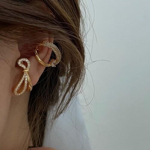 High sense bow stud earrings asymmetric earrings female net red niche earrings ins simple ear clips