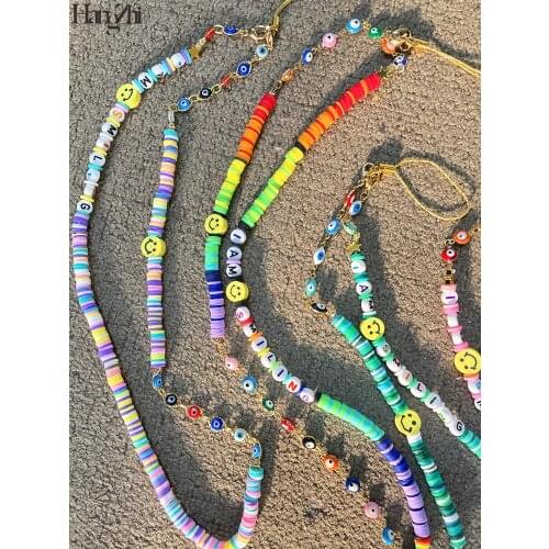 HangZhi 2021 New Rainbow Color Soft Pottery Smiling Evil Eye Handmade Beaded Chain for Mobile Phone Cell Phone Strap Lanyard