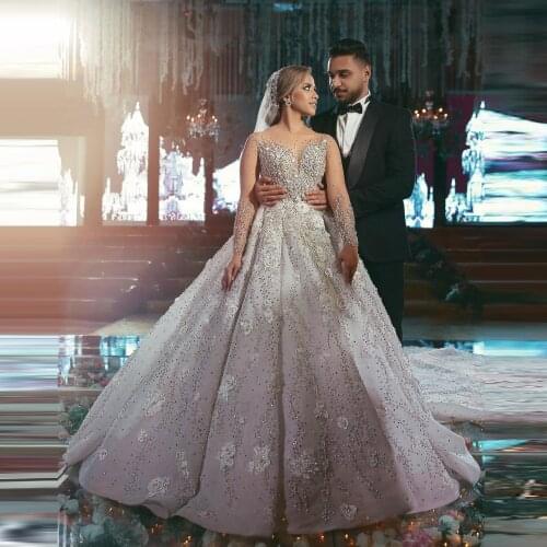 Luxury Dubai Wedding Dresses Long Sleeves Ball Gown Pearls Crystals Beaded Bridal Wedding Gowns Long Train Button Back