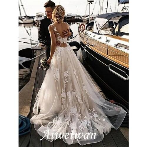 A-Line Wedding Dresses V Neck Court Train Tulle Spaghetti Strap Backless with Appliques 2021