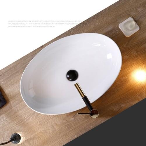 Bathroom Sink Ceramic White ovale Wash Basin Countertop Sinks Drainer Nordic Ceramic Washbasin Art Basin Shampoo Bowl