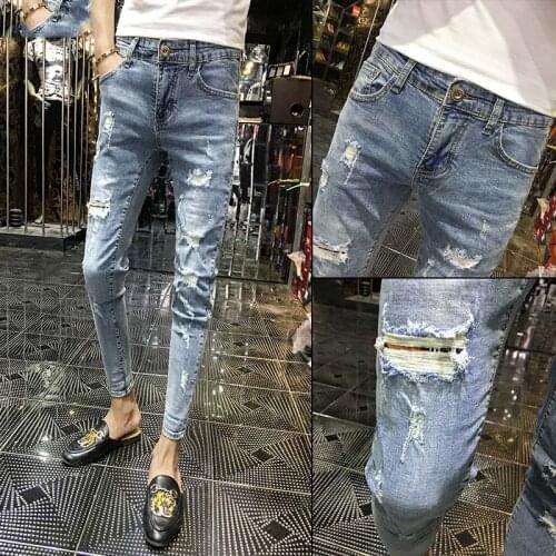 Wholesale 2020 Spring autumn cowboy guy denim jeans mens feet Slim jeans light blue beggar Ripped hole tight skinny pants men