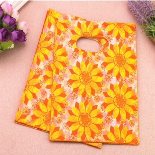 2017 New Design Wholesale 100pcs/lot 15*20cm Yellow Sunflower Gift Packaging Bags With Handles Plastic Shopping Gift Bags