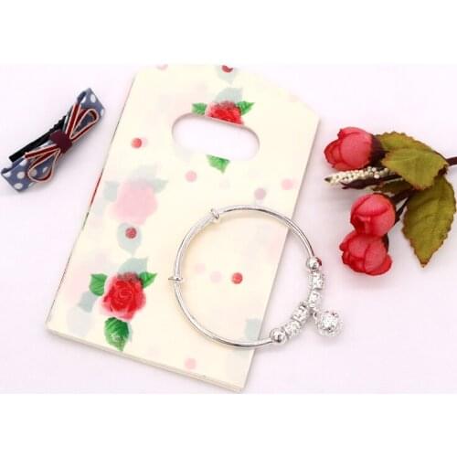 50pcs/lot Mini Plastic with Handle Jewelry Bags 9x15cm Cheap Beige with Red Flower Gift Candy Soap Packaging Bag Storage Pouches