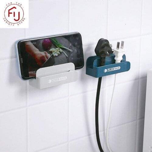 Wall Storage Organization Hook Power Plug Rack Socket Clip Holder Home Wall Mounted Self Adhesive Mobile Phone Charging Stand