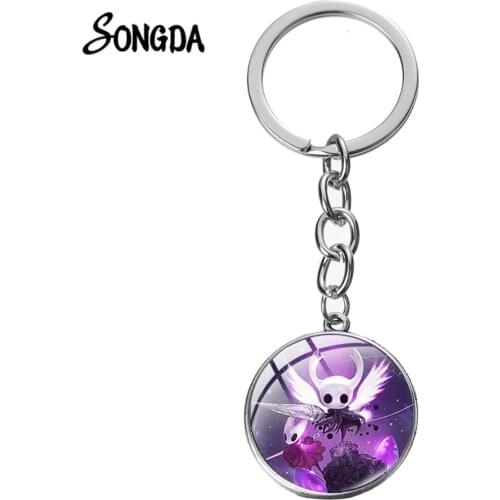 Hot Sale Hollow Knight Theme Long Keychain Glass Cabochon Silver Plated Pendant Octopus Cartoon Game Llaveros Bag Keyring