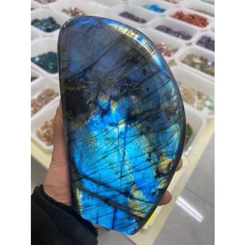 Natural labrador crystal irregular rough polishing specimens are placed at home 1700-1750g